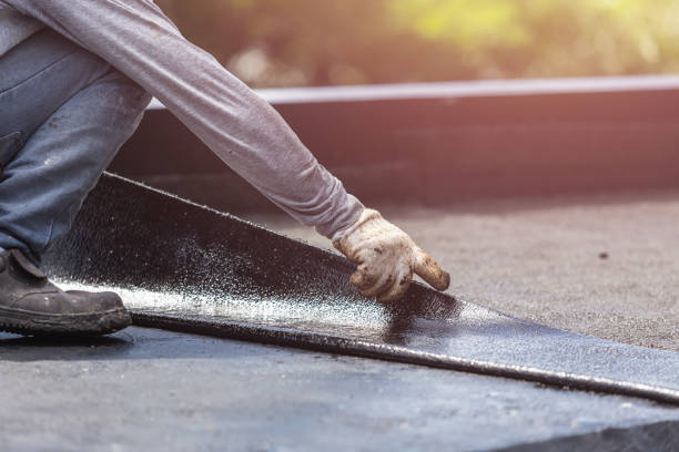 Professional Waterproofing technician working in Albany, NY